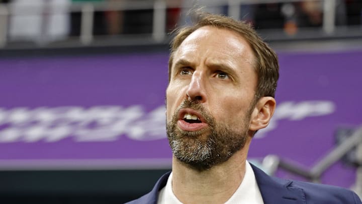 Nov 25, 2022; Al Khor, Qatar; England manager Gareth Southgate during the national anthem before a group stage match against the United States of America during the 2022 World Cup at Al Bayt Stadium. Mandatory Credit: Yukihito Taguchi-Imagn Images