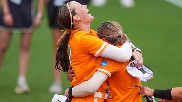 Tennessee infielder Emma Clarke (13) hugs Tennessee pitcher Sage Mardjetko (6) after winning a NCAA super regional game between Tennessee and Georgia, advancing to the Women’s College World Series at Sherri Parker Lee Stadium in Knoxville, Tenn., on May 22, 2026. Tennessee infielder Emma Clarke (13) hugs Tennessee pitcher Sage Mardjetko (6) after winning a NCAA super regional game between Tennessee and Georgia, advancing to the Women’s College World Series at Sherri Parker Lee Stadium in Knoxville, Tenn., on May 22, 2026.