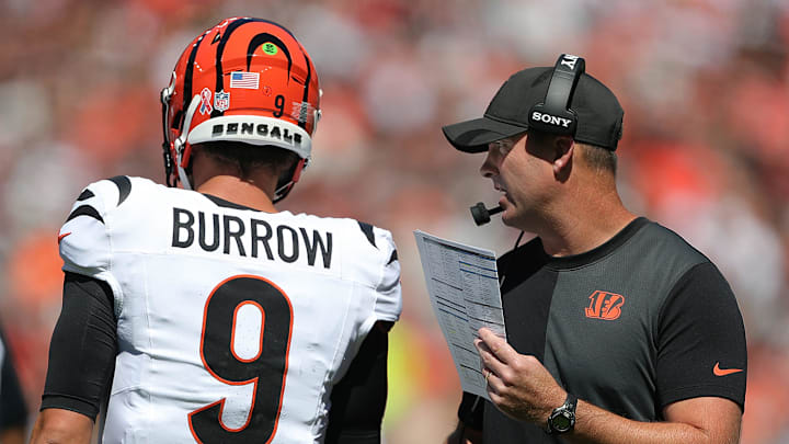 Cincinnati Bengals head coach Zac Taylor, right, has a word with quarterback Joe Burrow (9) during the first half of an NFL football game at Huntington Bank Field, Sept. 7, 2025, in Cleveland, Ohio. Cincinnati Bengals head coach Zac Taylor, right, has a word with quarterback Joe Burrow (9) during the first half of an NFL football game at Huntington Bank Field, Sept. 7, 2025, in Cleveland, Ohio.