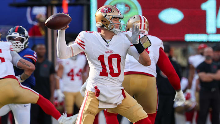 Nov 2, 2025; East Rutherford, New Jersey, USA; San Francisco 49ers quarterback Mac Jones (10) stands in the pocket against the New York Giants during the first half at MetLife Stadium. Mandatory Credit: Ed Mulholland-Imagn Images
