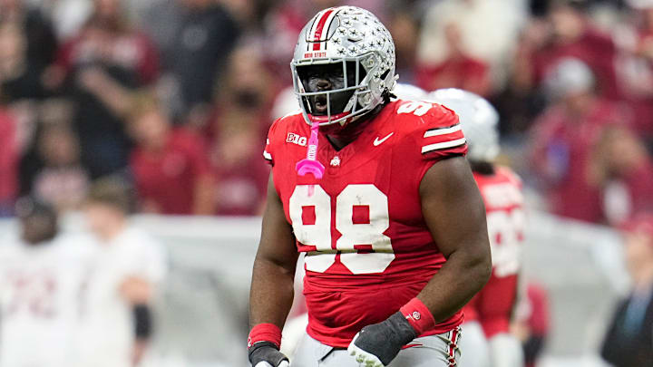 Ohio State Buckeyes defensive tackle Kayden McDonald (98) celebrates during the first half of the Big Ten Conference championship game against the Indiana Hoosiers at Lucas Oil Stadium in Indianapolis on Dec. 6, 2025.