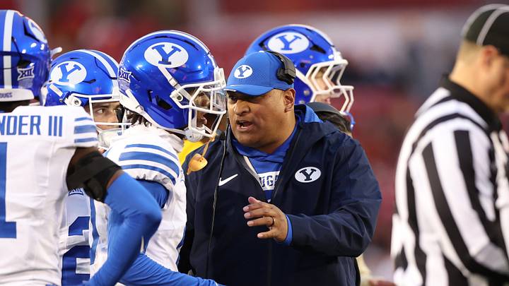 Oct 25, 2025; Ames, Iowa, USA; BYU Cougars head coach Kalani Sitake talks with his players during a timeout in their game with the Iowa State Cyclones at Jack Trice Stadium. Mandatory Credit: Reese Strickland-Imagn Images Oct 25, 2025; Ames, Iowa, USA; BYU Cougars head coach Kalani Sitake talks with his players during a timeout in their game with the Iowa State Cyclones at Jack Trice Stadium. Mandatory Credit: Reese Strickland-Imagn Images