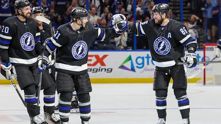 Nikita Kucherov and Brayden Point celebrating a goal in the final game of the 2023-24 regular season against the Toronto Maple Leafs