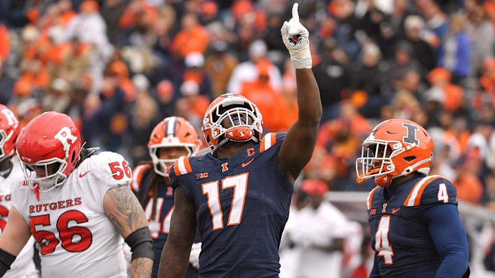 Fighting Illini edge player Gabe Jacas celebrates his sack of Rutgers QB Athan Kaliakmanis. Jacas is among the edge players at the Senior Bowl this week.