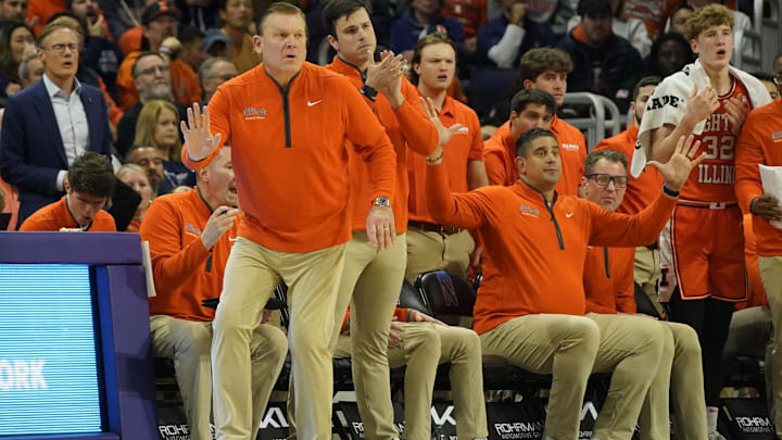 Dec 6, 2024; Evanston, Illinois, USA; Illinois Fighting Illini head coach Brad Underwood  gestures to his team against the Northwestern Wildcats during the first half at Welsh-Ryan Arena. Mandatory Credit: David Banks-Imagn Images