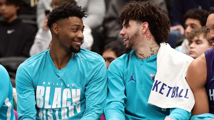 Feb 22, 2026; Washington, District of Columbia, USA; Charlotte Hornets forward Brandon Miller (24) speaks with Charlotte Hornets guard LaMelo Ball (1) during the second half against the Washington Wizards at Capital One Arena. Mandatory Credit: Daniel Kucin Jr.-Imagn Images