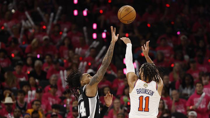 Jun 3, 2026; San Antonio, Texas, USA; New York Knicks guard Jalen Brunson (11) shoots the ball past San Antonio Spurs guard Devin Vassell (24) 