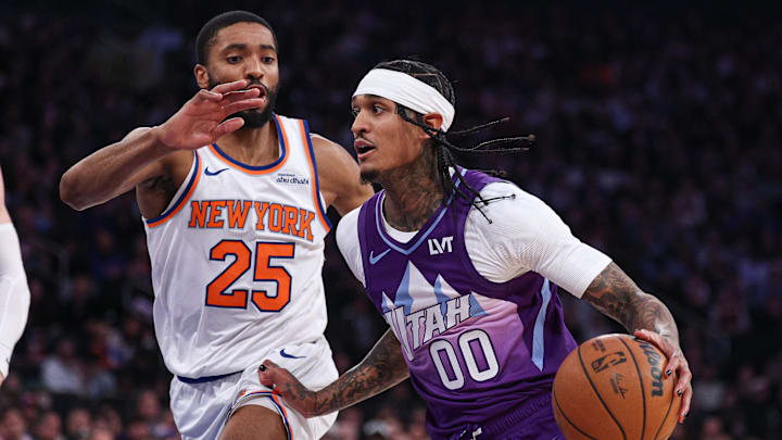 Jan 1, 2025; New York, New York, USA; Utah Jazz guard Jordan Clarkson (00) dribbles as New York Knicks forward Mikal Bridges (25) defends during the first half at Madison Square Garden. Mandatory Credit: Vincent Carchietta-Imagn Images Jan 1, 2025; New York, New York, USA; Utah Jazz guard Jordan Clarkson (00) dribbles as New York Knicks forward Mikal Bridges (25) defends during the first half at Madison Square Garden. Mandatory Credit: Vincent Carchietta-Imagn Images