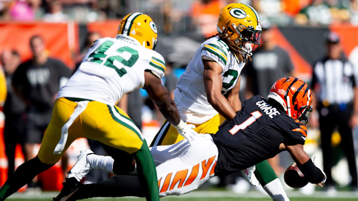 Cincinnati Bengals wide receiver Ja'Marr Chase (1) catches a deflected pass as Green Bay Packers cornerback Eric Stokes (21) and Green Bay Packers inside linebacker Oren Burks (42) attempt to stop him in the second half of the NFL football game on Sunday, Oct. 10, 2021, at Paul Brown Stadium in Cincinnati. Green Bay Packers defeated Cincinnati Bengals 25-22 in overtime.
Green Bay Packers At Cincinnati Bengals 62 Cincinnati Bengals wide receiver Ja'Marr Chase (1) catches a deflected pass as Green Bay Packers cornerback Eric Stokes (21) and Green Bay Packers inside linebacker Oren Burks (42) attempt to stop him in the second half of the NFL football game on Sunday, Oct. 10, 2021, at Paul Brown Stadium in Cincinnati. Green Bay Packers defeated Cincinnati Bengals 25-22 in overtime.
Green Bay Packers At Cincinnati Bengals 62