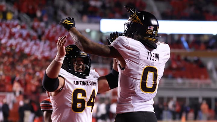 Oct 11, 2025; Salt Lake City, Utah, USA; Arizona State Sun Devils wide receiver Jordyn Tyson (0) celebrates scoring a touchdown against the Utah Utes with Arizona State Sun Devils offensive lineman Wade Helton (64) during the third quarter at Rice-Eccles Stadium. Mandatory Credit: Rob Gray-Imagn Images