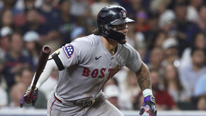 Aug 11, 2025; Houston, Texas, USA; Boston Red Sox left fielder Jarren Duran (16) hits a single during the third inning against the Houston Astros at Daikin Park. Mandatory Credit: Troy Taormina-Imagn Images