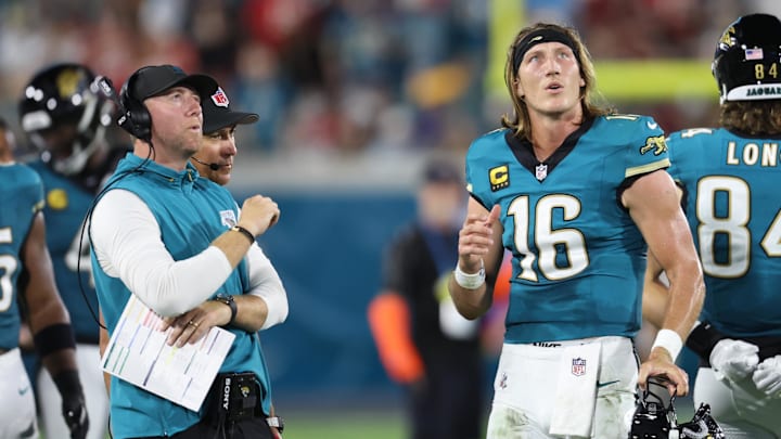 Oct 6, 2025; Jacksonville, Florida, USA; Jacksonville Jaguars head coach Liam Coen and quarterback Trevor Lawrence (16) during the first half against the Kansas City Chiefs at EverBank Stadium. Mandatory Credit: Morgan Tencza-Imagn Images