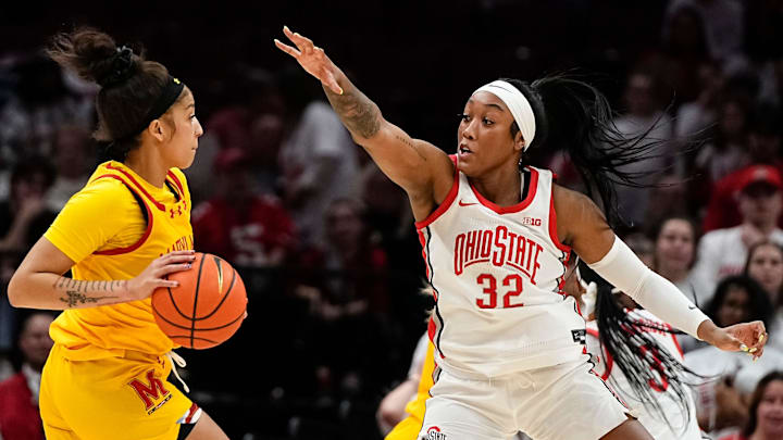 Ohio State Buckeyes forward Cotie McMahon (32) defends Maryland Terrapins guard Kaylene Smikle (2) during the second half of the NCAA women's basketball game at Value City Arena on Jan. 23, 2025. Ohio State won 74-66.