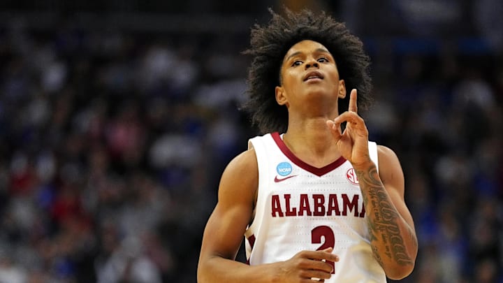 Mar 27, 2025; Newark, NJ, USA; Alabama Crimson Tide guard Aden Holloway (2) celebrates making a three pointer during the second half against the Brigham Young Cougars during an East Regional semifinal of the 2025 NCAA tournament at Prudential Center. Mandatory Credit: Robert Deutsch-Imagn Images