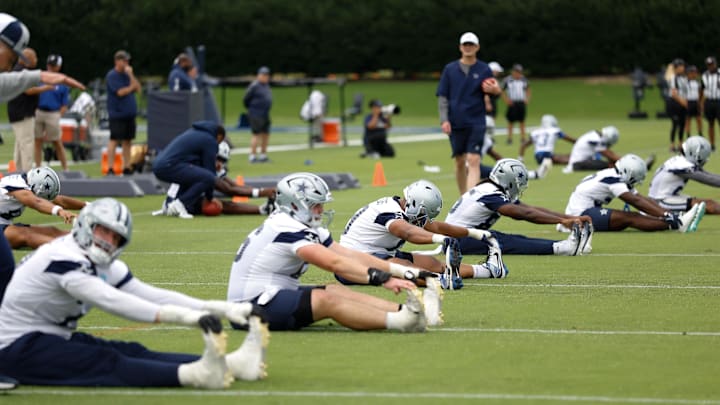 The Dallas Cowboys go through drills at the Ford Center at the Star Training Facility in Frisco, Texas. 