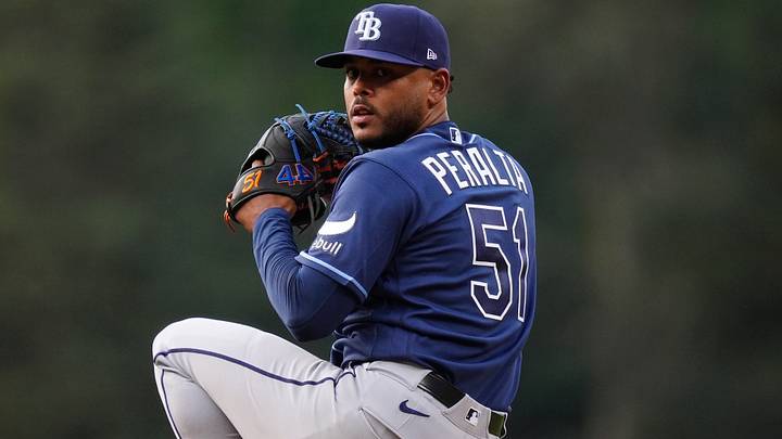 Aug 4, 2026; Denver, Colorado, USA; Tampa Bay Rays starting pitcher Freddy Peralta (51) delivers a pitch in the first inning against the Colorado Rockies at Coors Field. Mandatory Credit: Ron Chenoy-Imagn Images Aug 4, 2026; Denver, Colorado, USA; Tampa Bay Rays starting pitcher Freddy Peralta (51) delivers a pitch in the first inning against the Colorado Rockies at Coors Field. Mandatory Credit: Ron Chenoy-Imagn Images