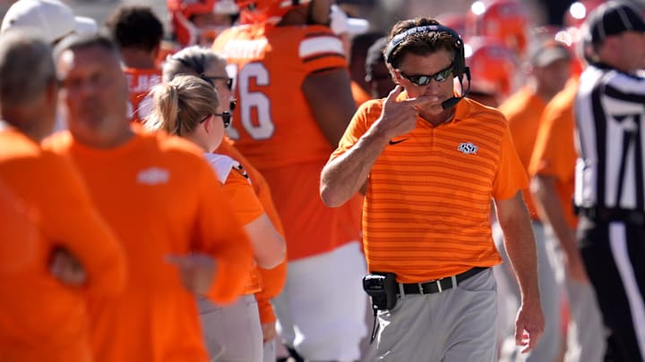 Oklahoma State coach Mike Gundy walks on the sideline during a college football game between the Oklahoma State Cowboys (OSU) and the West Virginia Mountaineers at Boone Pickens Stadium in Stillwater, Okla., Saturday, Oct. 5, 2024. Oklahoma State coach Mike Gundy walks on the sideline during a college football game between the Oklahoma State Cowboys (OSU) and the West Virginia Mountaineers at Boone Pickens Stadium in Stillwater, Okla., Saturday, Oct. 5, 2024.