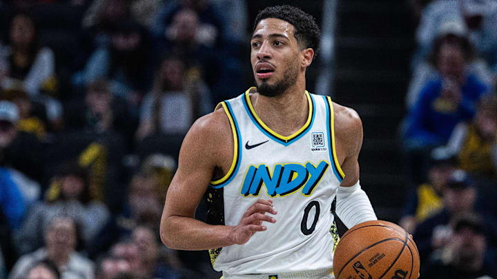 Jan 29, 2025; Indianapolis, Indiana, USA; Indiana Pacers guard Tyrese Haliburton (0) dribbles the ball in the first half against the Detroit Pistons at Gainbridge Fieldhouse. Mandatory Credit: Trevor Ruszkowski-Imagn Images