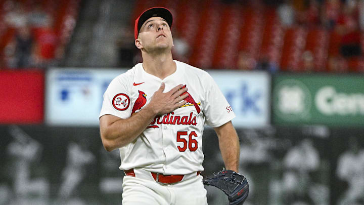 Sep 17, 2024; St. Louis, Missouri, USA;  St. Louis Cardinals relief pitcher Ryan Helsley (56) reacts after closing out the ninth inning in a victory over the Pittsburgh Pirates at Busch Stadium.