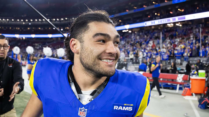Jan 13, 2025; Glendale, AZ, USA; Los Angeles Rams wide receiver Puka Nacua (17) celebrates after defeating the Minnesota Vikings during an NFC wild card game at State Farm Stadium. Mandatory Credit: Mark J. Rebilas-Imagn Images