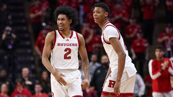 Jan 13, 2025; Piscataway, New Jersey, USA; Rutgers Scarlet Knights guard Dylan Harper (2) celebrates in front of guard Ace Bailey (4) during the second half against the UCLA Bruins at Jersey Mike's Arena. Mandatory Credit: Vincent Carchietta-Imagn Images