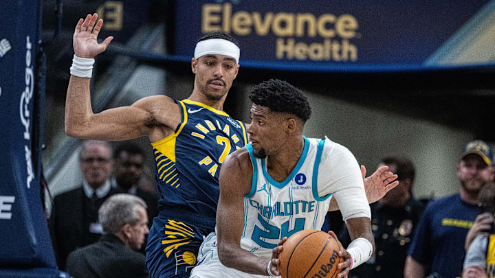 Charlotte Hornets forward Brandon Miller (24) holds the ball Charlotte Hornets forward Brandon Miller (24) holds the ball