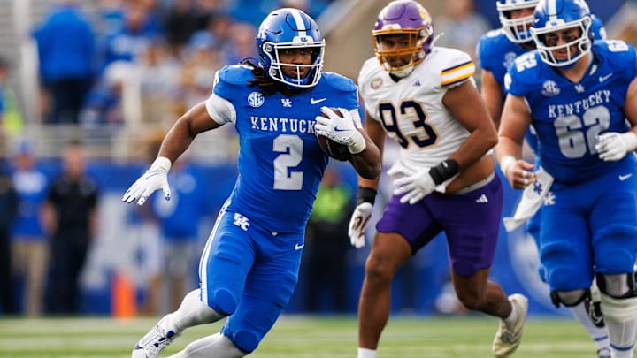 Nov 15, 2025; Lexington, Kentucky, USA; Kentucky Wildcats running back Dante Dowdell (2) runs the ball during the fourth quarter against the Tennessee Tech Golden Eagles at Kroger Field. Mandatory Credit: Jordan Prather-Imagn Images