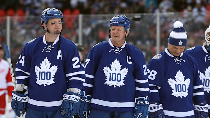 Dec 31, 2016; Toronto, ON, Canada; Toronto Maple Leafs defenseman Bryan McCabe (24) and forward Darryl Sittler (27) and forward Tie Domi (28) before their game against the Detroit Red Wings during the 2017 Rogers NHL Centennial Classic Alumni Game at BMO Field. The Red Wings beat the Maple Leafs 4-3. Mandatory Credit: Tom Szczerbowski-Imagn Images