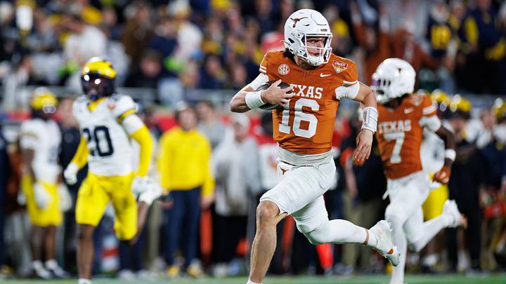 Dec 31, 2025; Orlando, FL, USA; Texas Longhorns quarterback Arch Manning (16) rushes with the ball for a touchdown against the Michigan Wolverines during the second half at Camping World Stadium. Mandatory Credit: Matt Pendleton-Imagn Images Dec 31, 2025; Orlando, FL, USA; Texas Longhorns quarterback Arch Manning (16) rushes with the ball for a touchdown against the Michigan Wolverines during the second half at Camping World Stadium. Mandatory Credit: Matt Pendleton-Imagn Images