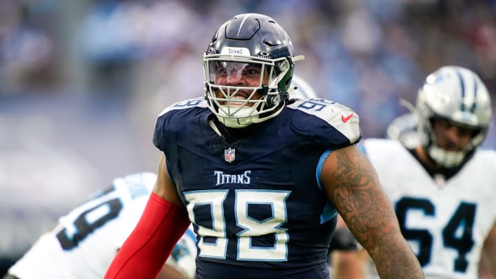Tennessee Titans defensive tackle Jeffery Simmons (98) celebrates sacking Carolina Panthers quarterback Bryce Young during the third quarter at Nissan Stadium in Nashville, Tenn., Sunday, Nov. 26, 2023.