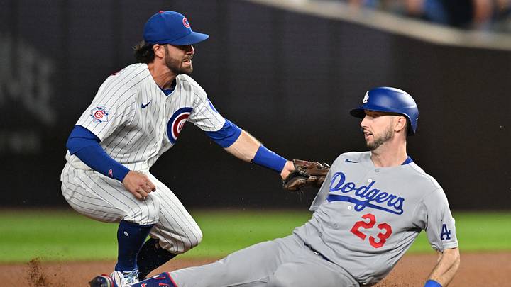 Aug 3, 2026; Chicago, Illinois, USA; Chicago Cubs shortstop Dansby Swanson (7) tags out Los Angeles Dodgers right fielder Kyle Tucker (23) during the sixth inning at Wrigley Field. Mandatory Credit: Patrick Gorski-Imagn Images Aug 3, 2026; Chicago, Illinois, USA; Chicago Cubs shortstop Dansby Swanson (7) tags out Los Angeles Dodgers right fielder Kyle Tucker (23) during the sixth inning at Wrigley Field. Mandatory Credit: Patrick Gorski-Imagn Images