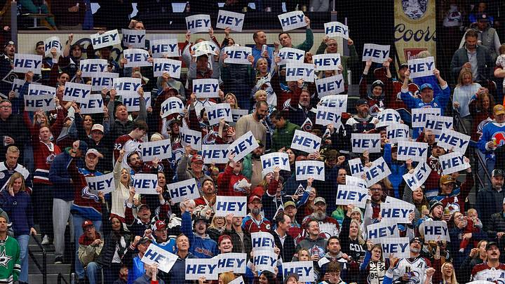 Oct 14, 2026; Denver, Colorado, USA; Colorado Avalanche fans celebrate after a goal in the second period against the Dallas Stars at Ball Arena. Mandatory Credit: Isaiah J. Downing-Imagn Images