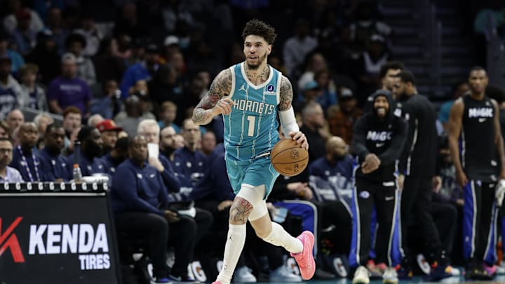 Charlotte Hornets guard LaMelo Ball (1) dribbles the ball up the court during the first quarter Charlotte Hornets guard LaMelo Ball (1) dribbles the ball up the court during the first quarter