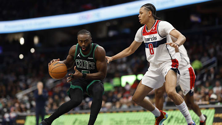 Oct 24, 2024; Washington, District of Columbia, USA; Boston Celtics guard Jaylen Brown (7) drives to the basket as Washington Wizards forward Kyshawn George (18) defends in the first half at Capital One Arena. Mandatory Credit: Geoff Burke-Imagn Images