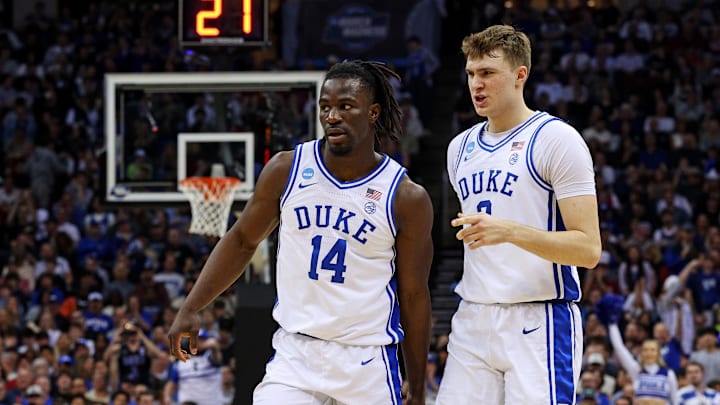 Mar 29, 2025; Newark, NJ, USA; Duke Blue Devils guard Sion James (14) and forward Cooper Flagg (2) celebrates during the first half against the Alabama Crimson Tide in the East Regional final of the 2025 NCAA tournament at Prudential Center. Mandatory Credit: Vincent Carchietta-Imagn Images