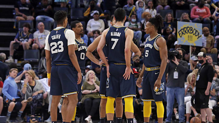Apr 10, 2022; Memphis, Tennessee, USA; Memphis Grizzlies guard Jarrett Culver (23), guard De'Anthony Melton (0), guard Kyle Anderson (1), forward Santi Aldama (7) and guard Yves Pons (5) huddle up during a timeout during the second half against the Boston Celtics at FedExForum. Mandatory Credit: Petre Thomas-Imagn Images