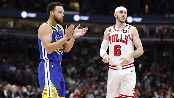 Jan 12, 2024; Chicago, Illinois, USA; Golden State Warriors guard Stephen Curry (30) reacts after a play against Chicago Bulls guard Alex Caruso (6) during the first half at United Center. Mandatory Credit: Kamil Krzaczynski-Imagn Images Jan 12, 2024; Chicago, Illinois, USA; Golden State Warriors guard Stephen Curry (30) reacts after a play against Chicago Bulls guard Alex Caruso (6) during the first half at United Center. Mandatory Credit: Kamil Krzaczynski-Imagn Images