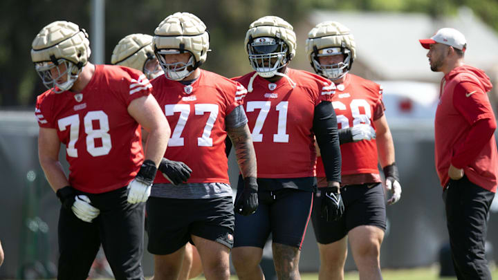 San Francisco 49ers offensive linemen Ben Bartch (78), Dominick Puni (77), Trent Williams (71) and Colton McKivitz (68) during an OTA at Levi's Stadium. Mandatory Credit: D. Ross Cameron-Imagn Images San Francisco 49ers offensive linemen Ben Bartch (78), Dominick Puni (77), Trent Williams (71) and Colton McKivitz (68) during an OTA at Levi's Stadium. Mandatory Credit: D. Ross Cameron-Imagn Images