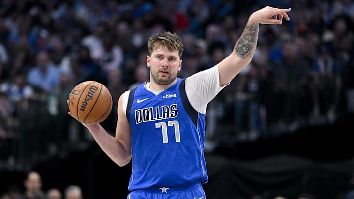 Apr 4, 2024; Dallas, Texas, USA; Dallas Mavericks guard Luka Doncic (77) sets the play against the Apr 4, 2024; Dallas, Texas, USA; Dallas Mavericks guard Luka Doncic (77) sets the play against the
