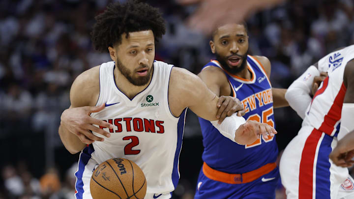 Apr 24, 2025; Detroit, Michigan, USA; Detroit Pistons guard Cade Cunningham (2) is defended by New York Knicks forward Mikal Bridges (25) in the second half during game three of first round for the 2024 NBA Playoffs at Little Caesars Arena. Mandatory Credit: Rick Osentoski-Imagn Images
