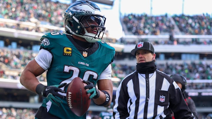 Dec 14, 2025; Philadelphia, Pennsylvania, USA; Philadelphia Eagles running back Saquon Barkley (26) reacts after scoring a touchdown against the Las Vegas Raiders during the second quarter at Lincoln Financial Field. Mandatory Credit: Bill Streicher-Imagn Images Dec 14, 2025; Philadelphia, Pennsylvania, USA; Philadelphia Eagles running back Saquon Barkley (26) reacts after scoring a touchdown against the Las Vegas Raiders during the second quarter at Lincoln Financial Field. Mandatory Credit: Bill Streicher-Imagn Images