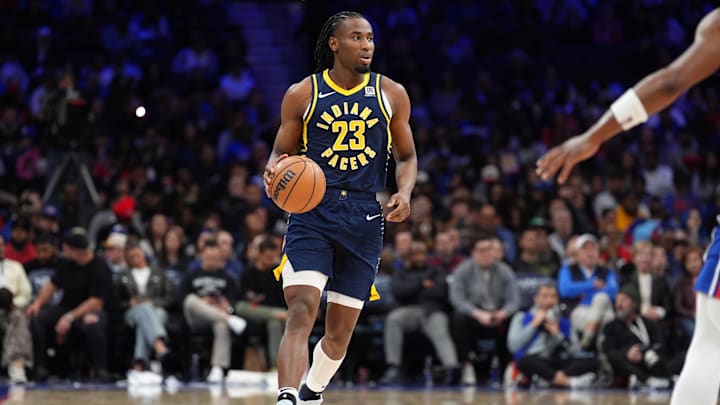 Mar 14, 2025; Philadelphia, Pennsylvania, USA; Indiana Pacers guard Aaron Nesmith (23) controls the ball against the Philadelphia 76ers in the third quarter at Wells Fargo Center. Mandatory Credit: Kyle Ross-Imagn Images
