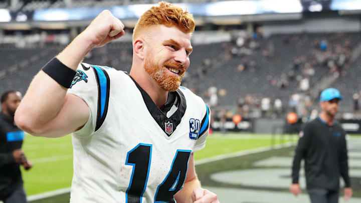 Sep 22, 2024; Paradise, Nevada, USA; Carolina Panthers quarterback Andy Dalton (14) celebrates after the Panthers defeated the Las Vegas Raiders at Allegiant Stadium. Mandatory Credit: Stephen R. Sylvanie-Imagn Images