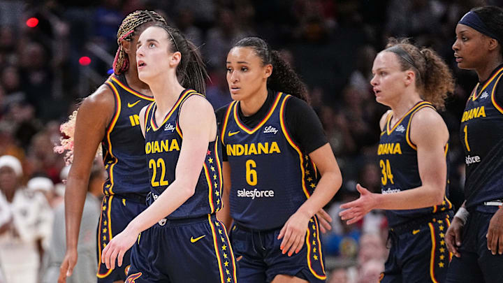 Indiana Fever guard Caitlin Clark (22) walks off the court.