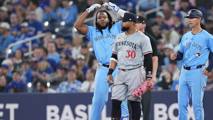 May 11, 2024; Toronto, Ontario, CAN; Toronto Blue Jays first base Vladimir Guerrero Jr. (27) celebrates hitting a single against the Minnesota Twins during the first inning at Rogers Centre. Mandatory Credit: Nick Turchiaro-USA TODAY Sports May 11, 2024; Toronto, Ontario, CAN; Toronto Blue Jays first base Vladimir Guerrero Jr. (27) celebrates hitting a single against the Minnesota Twins during the first inning at Rogers Centre. Mandatory Credit: Nick Turchiaro-USA TODAY Sports