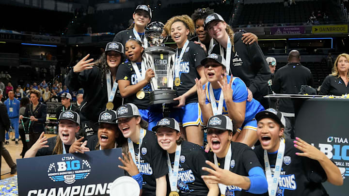 UCLA Bruins players celebrate after defeating the USC Trojans during the 2025 TIAA Big Ten Women's Basketball Tournament final on Sunday, March 9, 2025, at Gainbridge Fieldhouse in Indianapolis. UCLA defeated USC 72-67. UCLA Bruins players celebrate after defeating the USC Trojans during the 2025 TIAA Big Ten Women's Basketball Tournament final on Sunday, March 9, 2025, at Gainbridge Fieldhouse in Indianapolis. UCLA defeated USC 72-67.