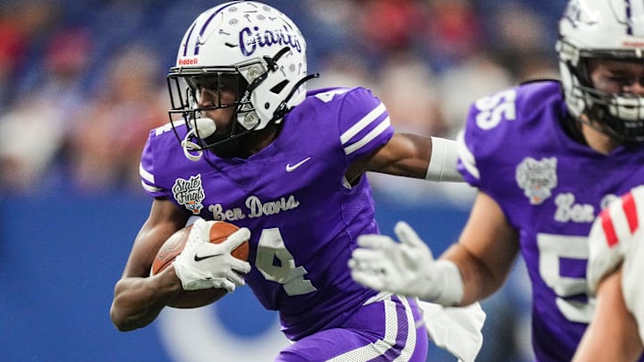 Ben Davis Giants Mark Zackery (4) rushes up the field Saturday, Nov. 25, 2023, during the IHSAA