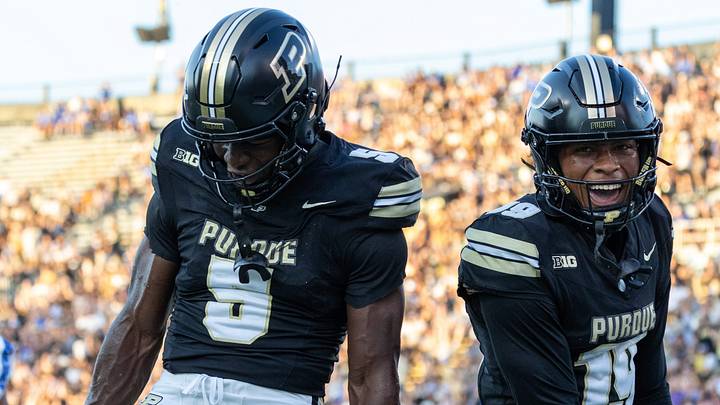 Purdue's Chauncey Magwood (left) and Asaad Waseem (right) celebrate after a touchdown. Purdue's Chauncey Magwood (left) and Asaad Waseem (right) celebrate after a touchdown.