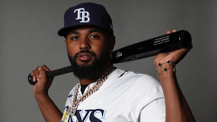 Feb 19, 2026; PortCharlotte, FL, USA; Tampa Bay Rays third baseman Junior Caminero (13) poses for a photo during media day at 