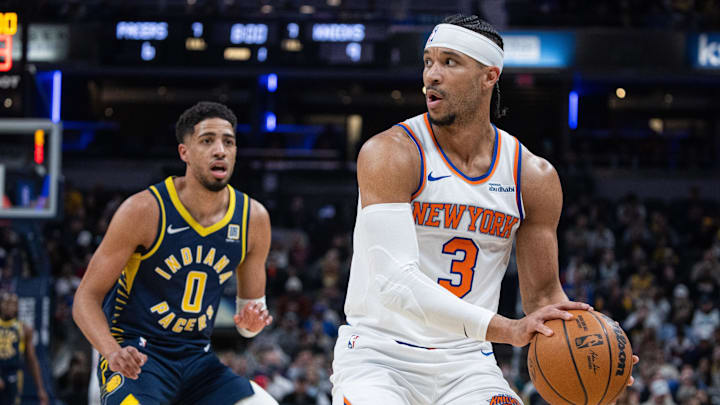Feb 11, 2025; Indianapolis, Indiana, USA; New York Knicks guard Josh Hart (3) holds the ball while Indiana Pacers guard Tyrese Haliburton (0) defends in the first half at Gainbridge Fieldhouse. Mandatory Credit: Trevor Ruszkowski-Imagn Images